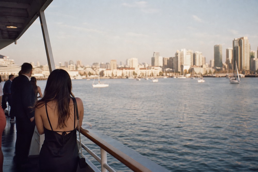 Evening outfits and deck details on a dusk cruise on San Diego Bay, late-morning light