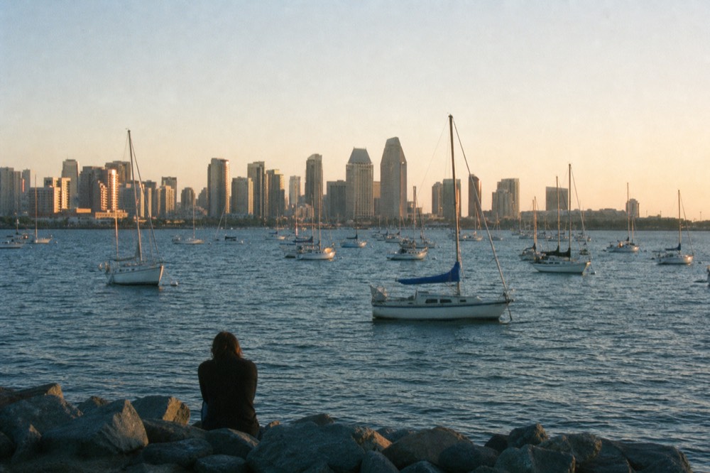 Sunset light over San Diego Bay and its sailboats, late-morning light